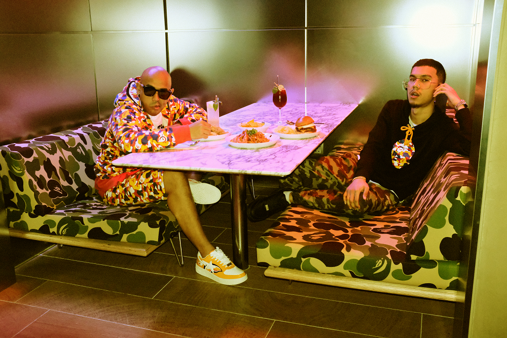 Local rapper Joe Flizzow (Left) and MK of K-Clique (Right) at the set of u00e2u20acu02dcCiaou00e2u20acu2122. u00e2u20acu201d Photo courtesy of Universal Music Malaysia