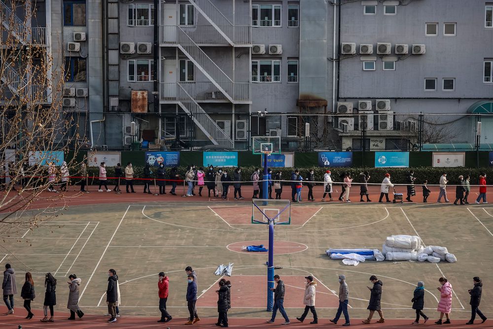 People line up to get their nucleic acid test on the sports ground of a school in Beijing, China January 22, 2021. u00e2u20acu201d Reuters pic
