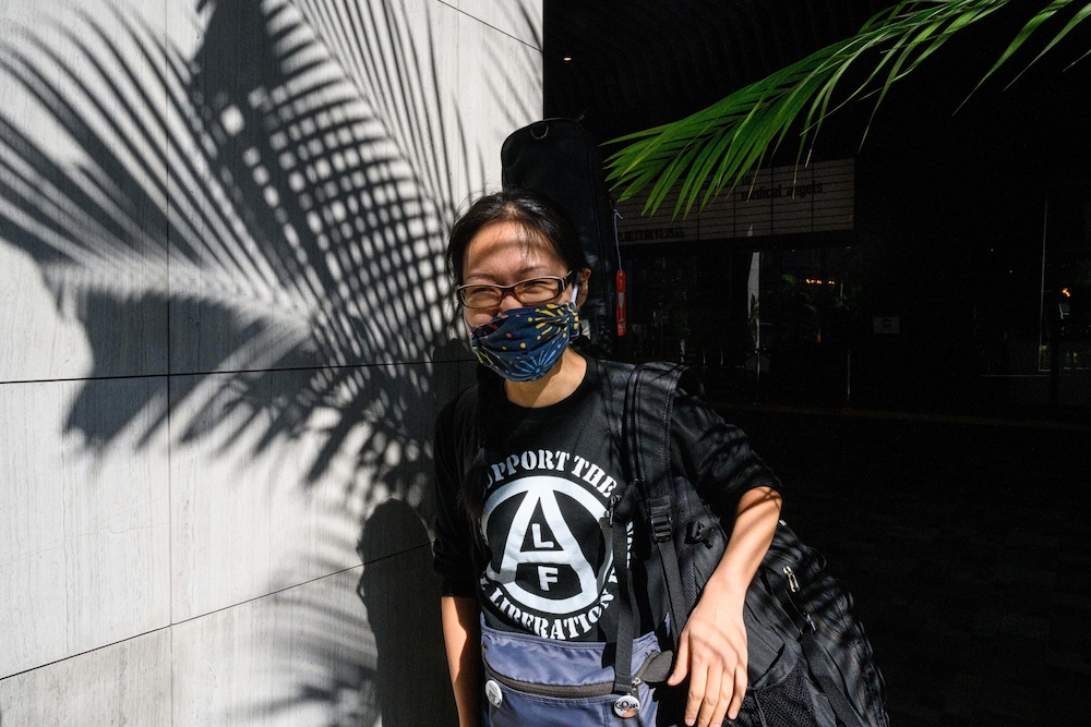 South Korean vegan entrepreneur Lee Jung-soo, reacting after leaving her hotel following the completion of her three-weeks of mandatory quarantine in Hong Kong. u00e2u20acu201d AFP pic