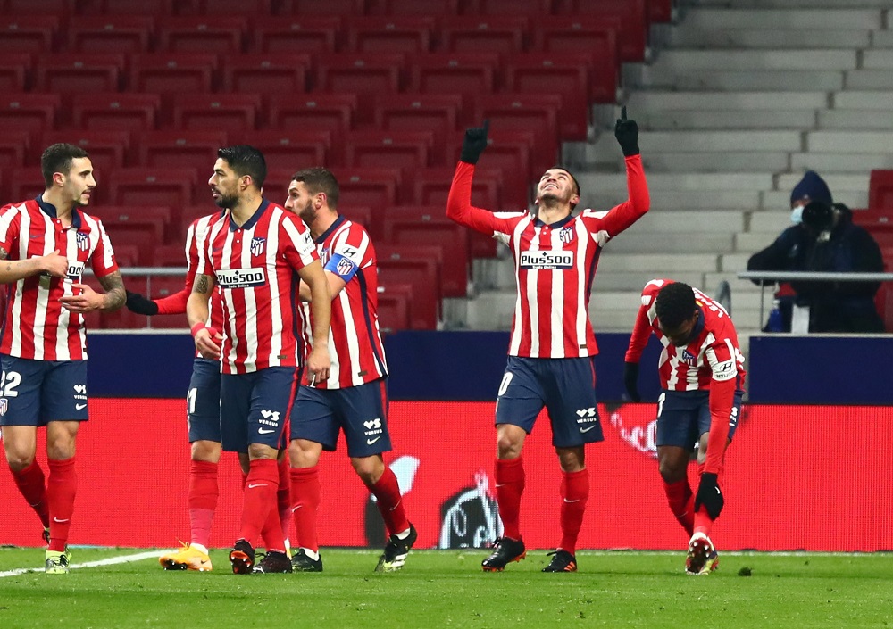 Atletico Madrid's Angel Correa celebrates with teammates after scoring the first goal against Sevilla January 13, 2021. u00e2u20acu2022 Reuters pic