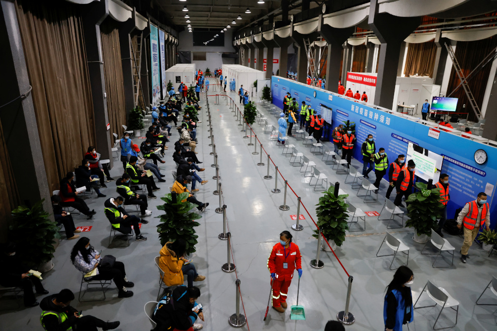 People are seen after receiving a dose of a coronavirus disease vaccine at a vaccination site, during a government-organised visit, in Beijing, China January 15, 2021. u00e2u20acu201d Reuters picnn