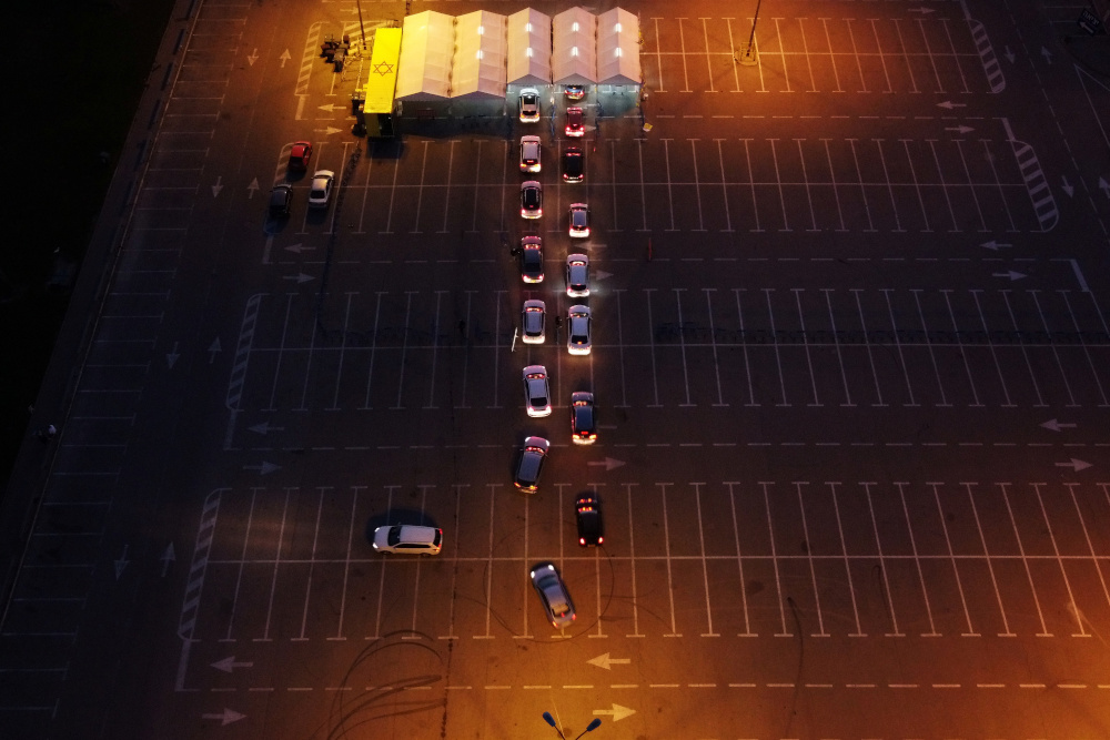 People wait in their cars to get tested for the coronavirus disease, as the country continues its national vaccination drive against it, during a third national Covid-19 lockdown, in Tel Aviv, Israel January 11, 2021. u00e2u20acu201d Reuters picnn