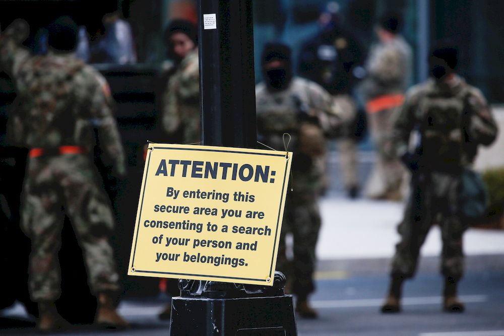 A placard with information for pedestrians is seen on a post as members of the National Guard secure the area near the Capitol for possible protest ahead of US President-elect Joe Bidenu00e2u20acu2122s inauguration, in Washington, January 16, 2021. u00e2u20acu201d Reuters pic