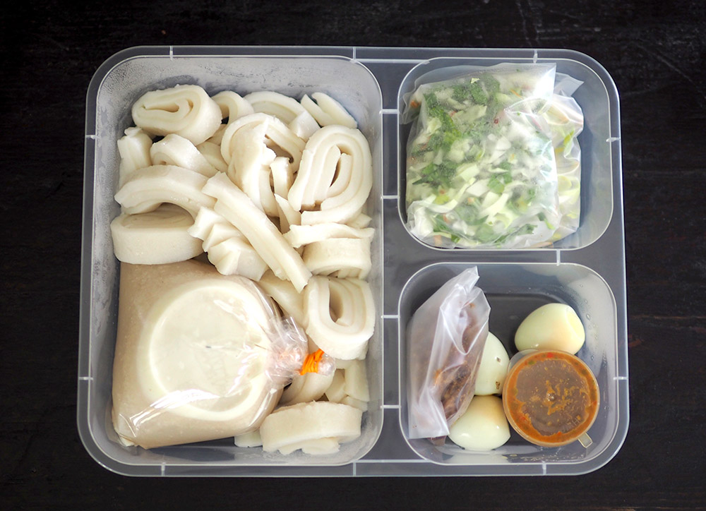 Your 'laksam special' comes in a box where the ingredients separated that makes mixing and eating it together easier.