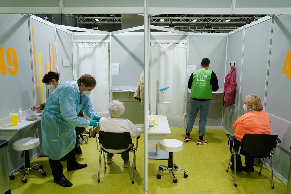 Elderly people are inoculated against the coronavirus disease on the opening day of a vaccination centre at the Messe Berlin trade fair grounds in Berlin, Germany January 18, 2021. u00e2u20acu2022 Reuters pic