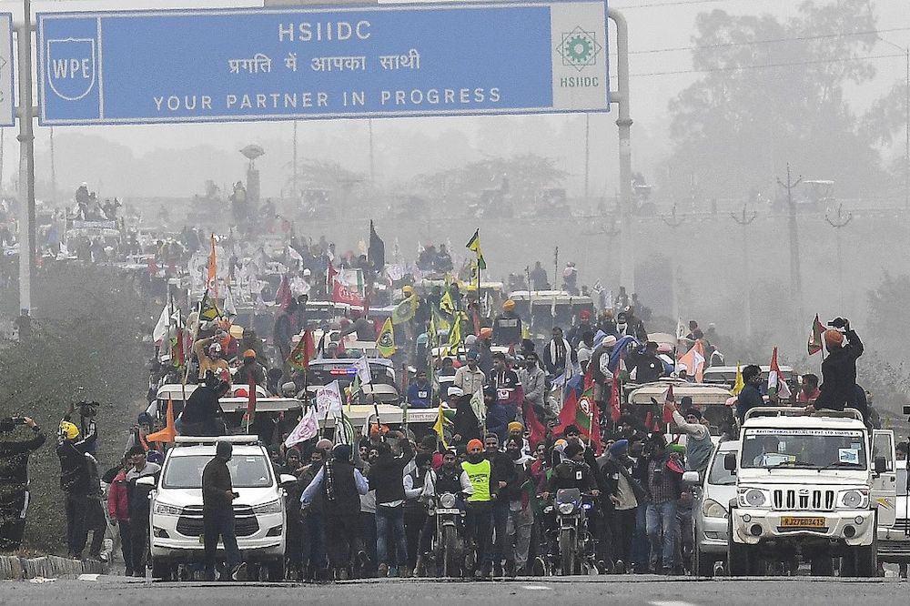 Farmers on tractors participate on a rally against the central governmentu00e2u20acu2122s recent agricultural reforms, on Kundliu00e2u20acu201cManesaru00e2u20acu201cPalwal (KMP) Expressway at Kundli in the Haryana state on January 7, 2021. u00e2u20acu201d AFP pic