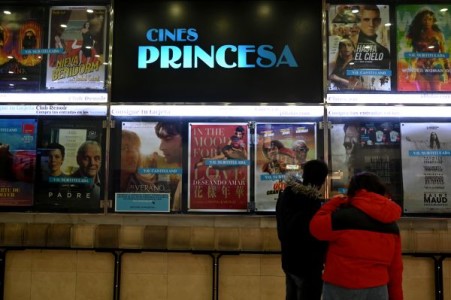 People arrive to see a movie at the Renoir theatre in Madrid on January 8, 2021. u00e2u20acu201d AFP=Relaxnews picnn