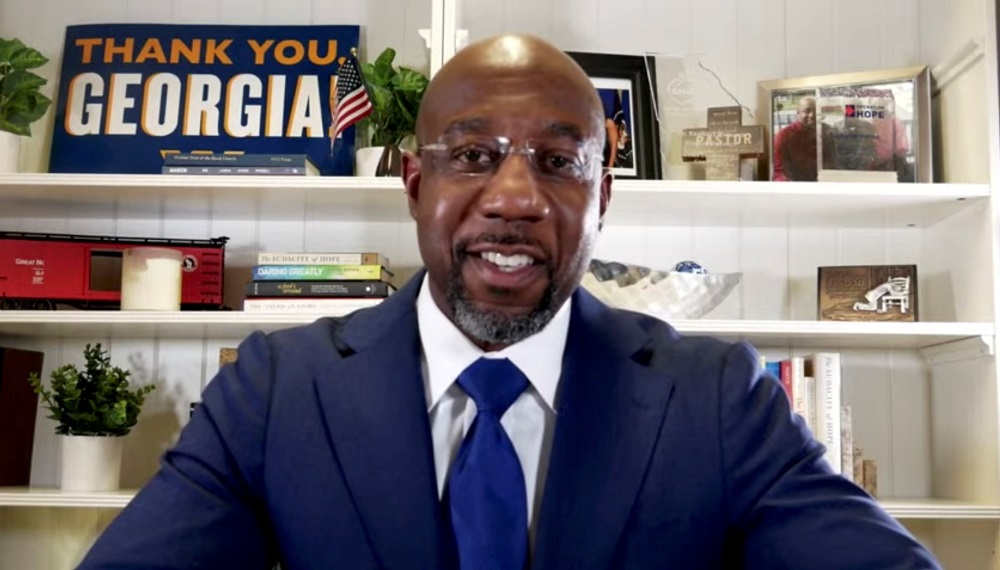 Democratic US Senate candidate Raphael Warnock speaks on his campaign's YouTube account after the runoff election against Republican Senator Kelly Loeffler in Atlanta, Georgia January 6, 2021. u00e2u20acu2022 Social media via Reuters pic