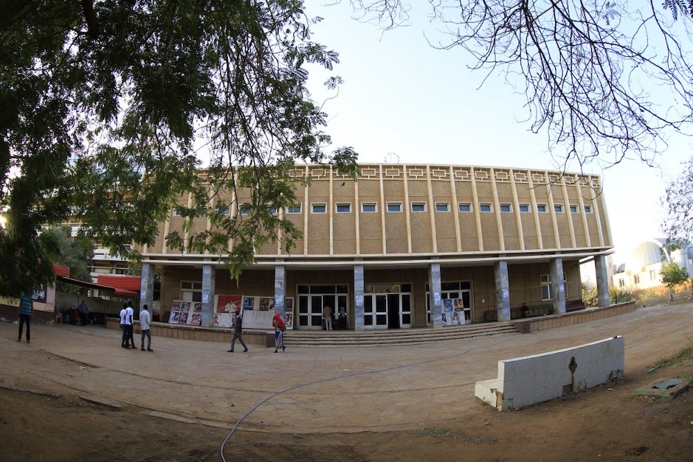 In this file photo taken on December 22, 2014, Sudanese men walk past the Palace of Youth and Children in Omdurman, one of the three functioning cinemas left in the capital Khartoum. u00e2u20acu201d AFP pic