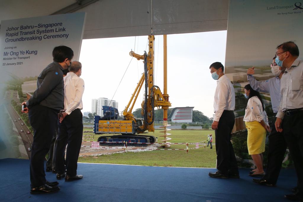 Minister for Transport Ong Ye Kung watches a rotary drilling rig drill into the ground at the Johor Baru-Singapore Rapid Transit System Link Groundbreaking Ceremony on January 22, 2021. u00e2u20acu2022 TODAY pic