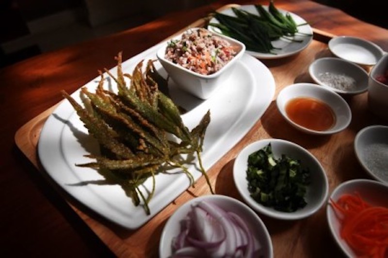 Fried cannabis leaves and minced pork with ingredients at the Abhaibhubejhr Spa Cuisine restaurant at the Abhaibhubejhr Day Spa, next to Chao Phraya Aphaiphubet Hospital in Prachinburi. — AFP-Relaxnews pic