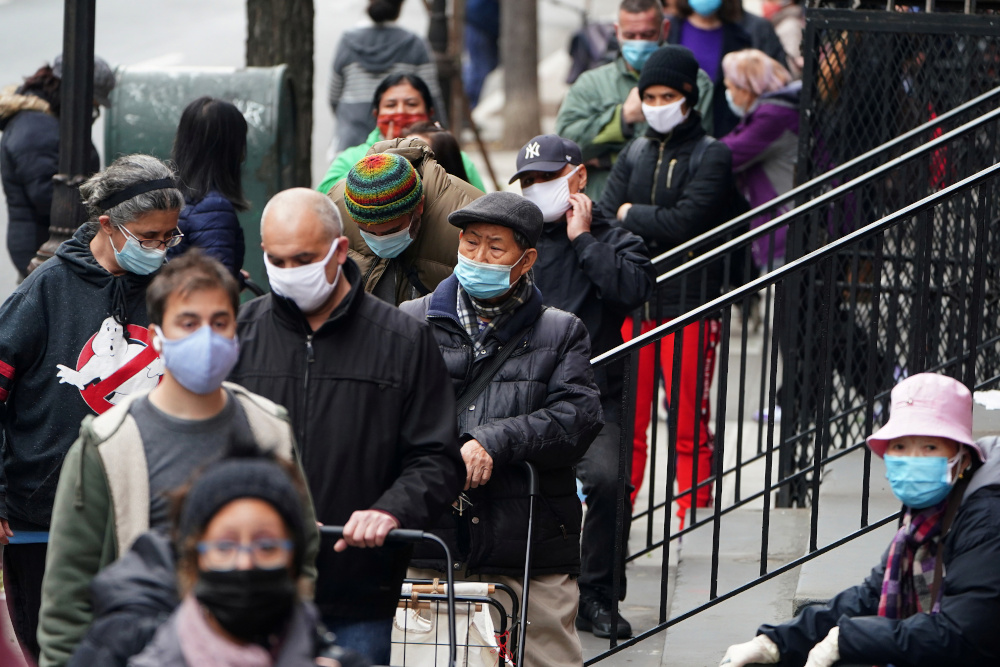 People wait in line at the St Clements Food Pantry for food during the coronavirus disease pandemic in the Manhattan borough of New York City, December 11, 2020. u00e2u20acu201d Reuters pic 