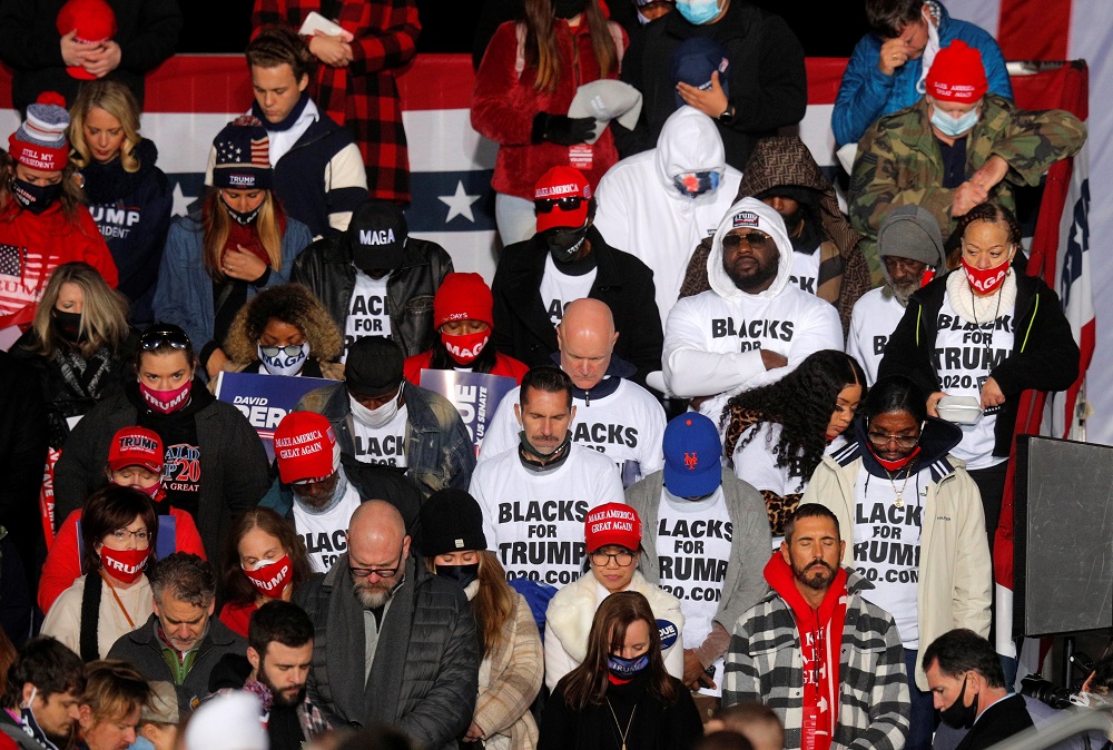 Supporters wait for the arrival of US President Donald Trump and Republican US Senator Kelly Loeffler as they campaign on the eve of Georgia's run-off election in Dalton, Georgia January 4, 2021. u00e2u20acu2022 Reuters pic