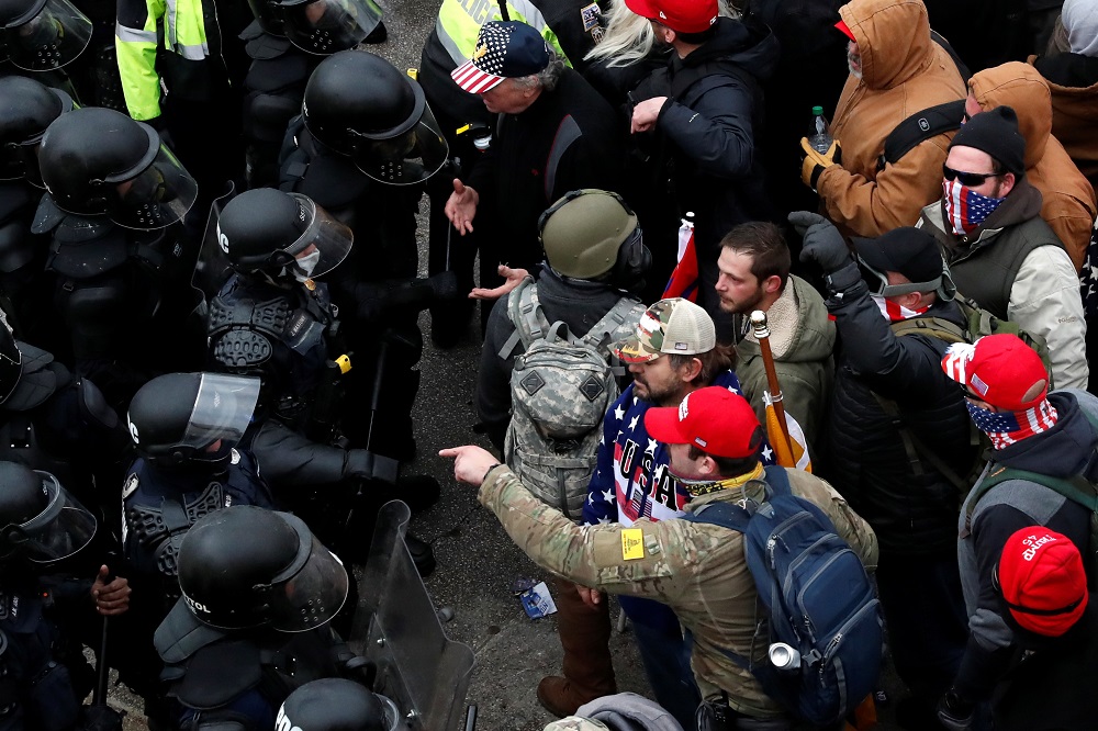Pro-Trump protesters clash with Capitol police during a rally to contest the certification of the 2020 US presidential election results by the US Congress in Washington January 6, 2021. u00e2u20acu2022 Reuters pic