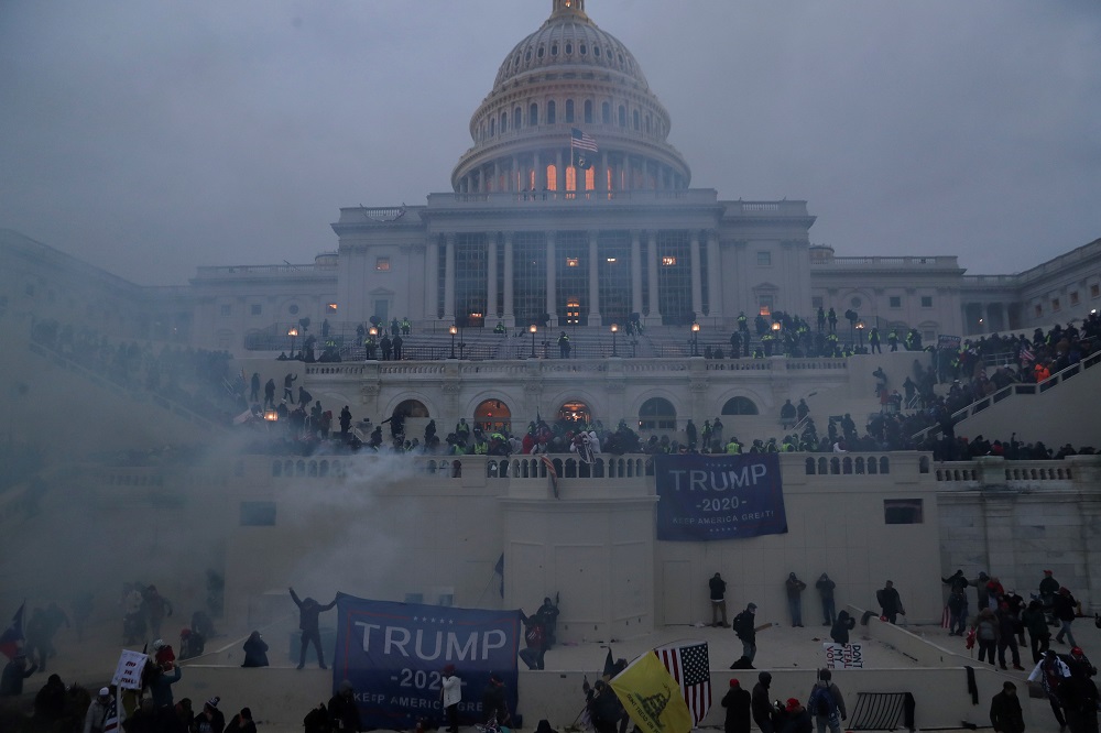 Police officers stand guard as supporters of US President Donald Trump gather in front of the US Capitol Building in Washington January 6, 2021. u00e2u20acu2022 Reuters pic