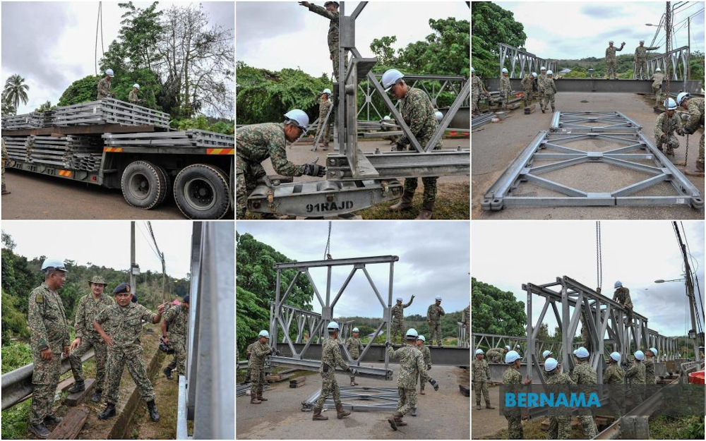 A team of military personnel spent over 15 hours building a temporary bridge for the convenience of over 500 residents in Kampung Lenchar, Ulu Dong in Raub January 7, 2021. u00e2u20acu201d Picture via Twitter/Bernama