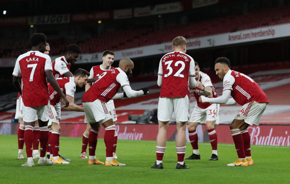 Arsenal's Pierre-Emerick Aubameyang celebrates scoring their first goal against Newcastle United with teammates at the Emirates Stadium, London January 18, 2021. u00e2u20acu201d Reuters pic