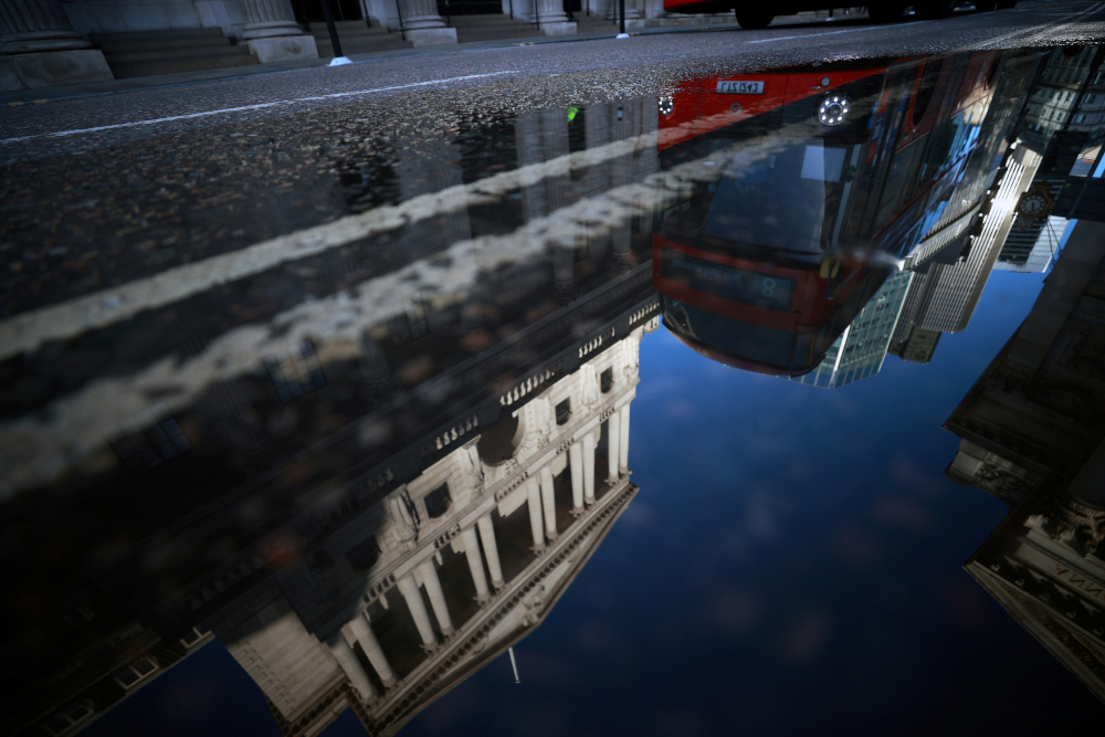 The Bank of England and the City of London financial district are reflected in a puddle, in London, Britain, December 17, 2020. u00e2u20acu201d Reuters pic 