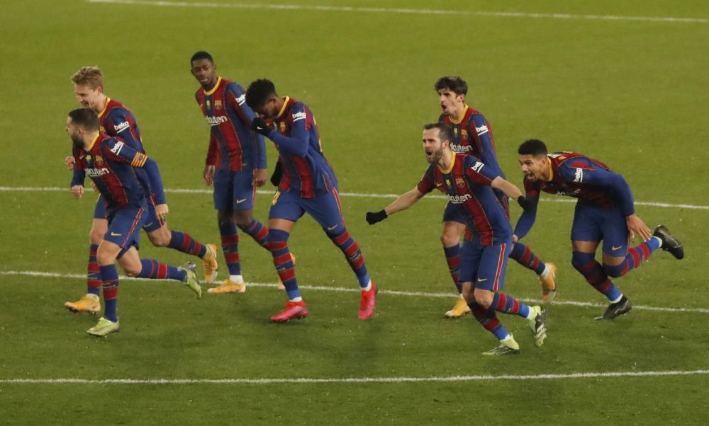 Barcelona players celebrate after winning the penalty shootout against Real Sociedad at Nuevo Arcangel, Cordoba January 13, 2021. u00e2u20acu201d Reuters pic