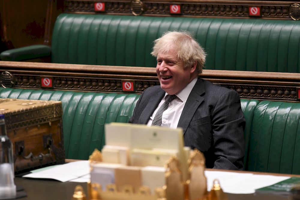 Britainu00e2u20acu2122s Prime Minister Boris Johnson reacts during a debate at the House of Commons in London, December 30, 2020. u00e2u20acu201d UK Parliament Handout via Reuters