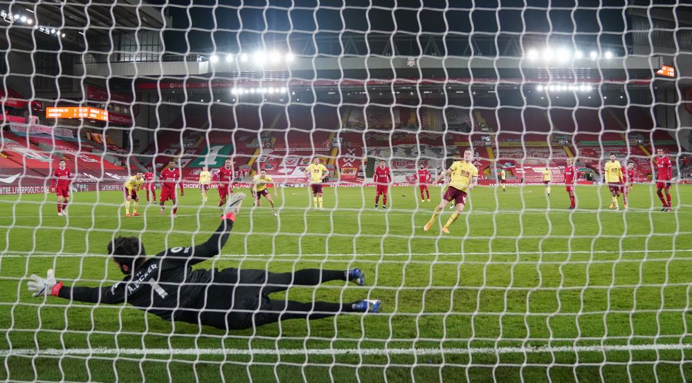 Burnley's Ashley Barnes scores their first goal against Liverpool from the penalty spot at Anfield January 21, 2021. u00e2u20acu201d Reuters pic