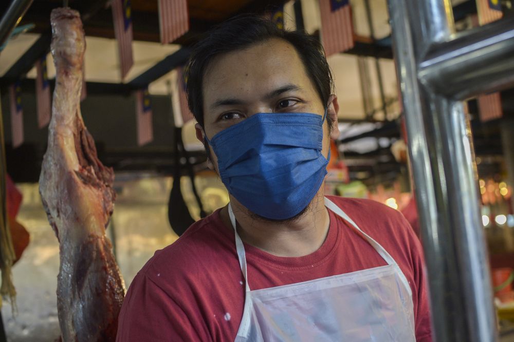 Abu says many prefer imported meat because local grown meats are more expensive. — Picture by Miera Zulyana