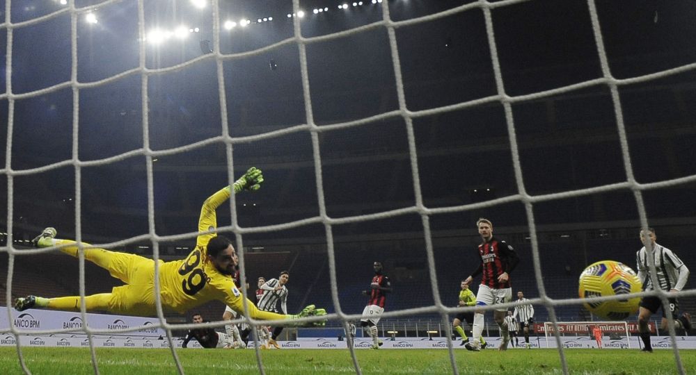 Juventus' Federico Chiesa scores against AC Milan at the San Siro, Milan November 28, 2020. u00e2u20acu201d Reuters picnn