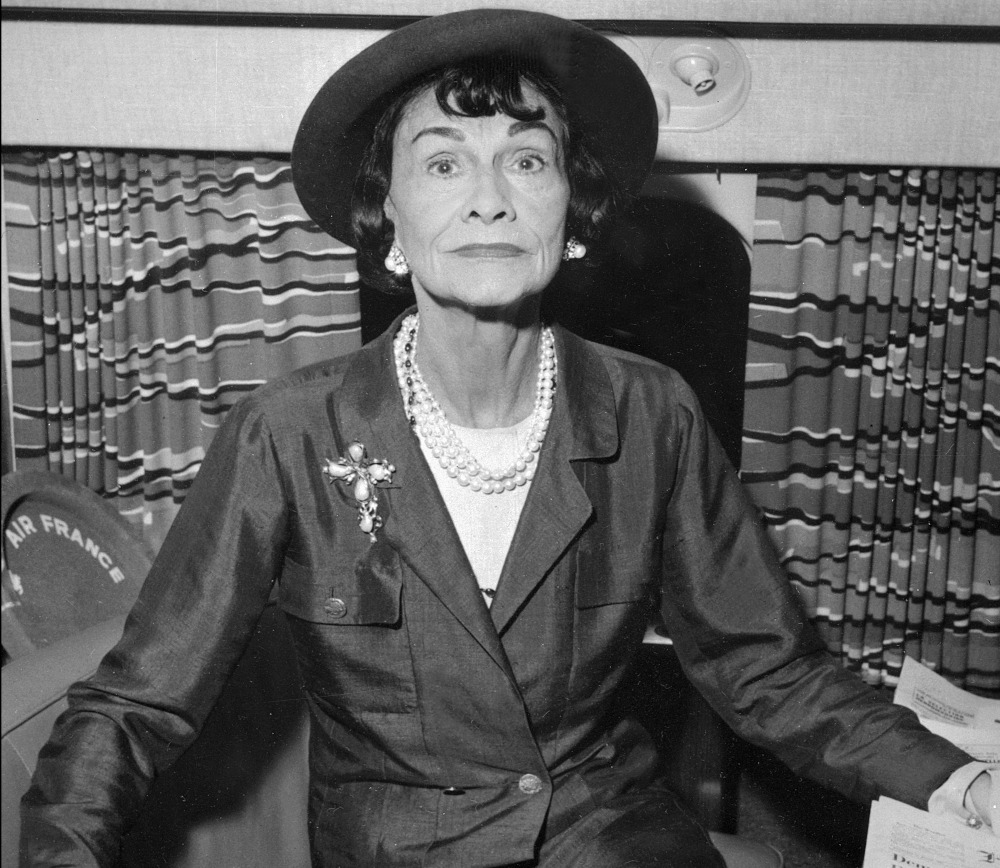 In this file photo taken January 1, 1960, French fashion designer Coco Chanel poses onboard of a plane at Paris airport. u00e2u20acu201d AFP picnn
