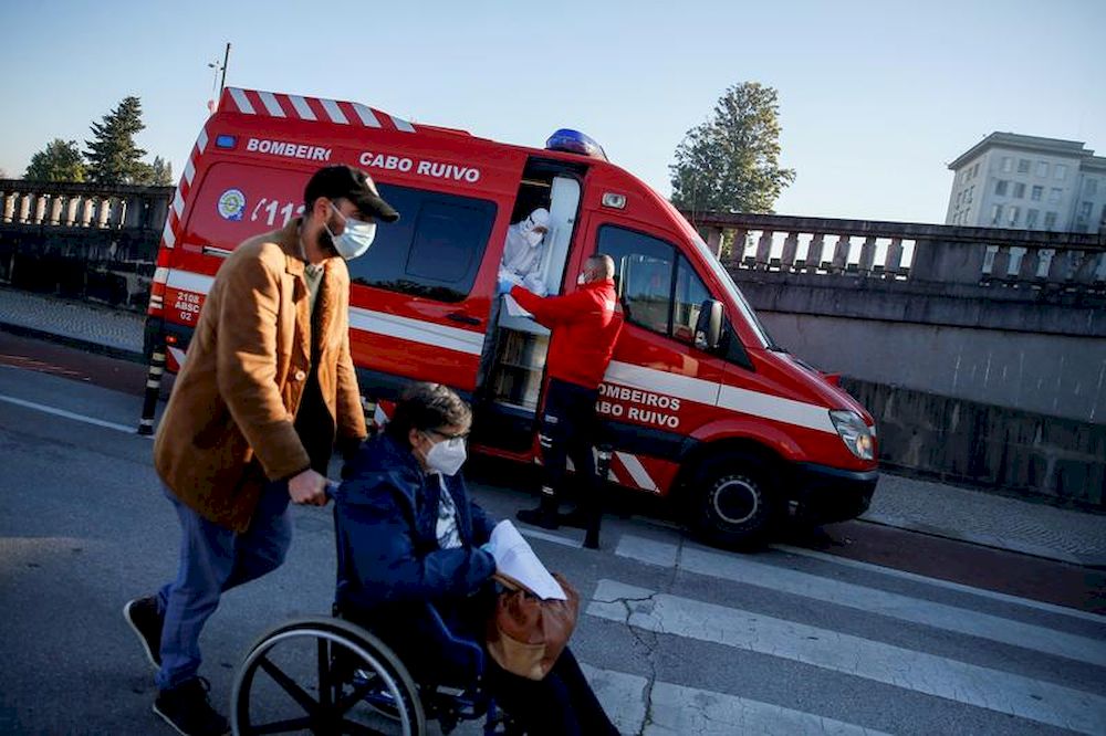 An ambulance carrying a Covid-19 patient is seen outside Santa Maria Hospital, during the coronavirus disease (Covid-19) pandemic in Lisbon, Portugal, January 18, 2021. u00e2u20acu201d Reuters pic