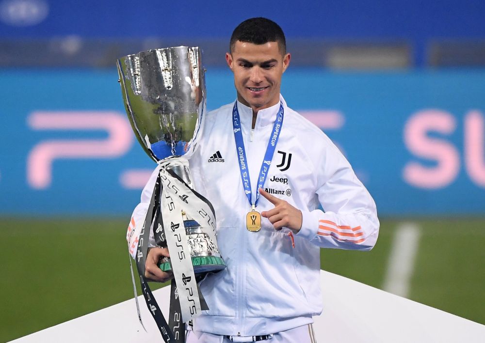 Juventus' Cristiano Ronaldo celebrates with the Italian Super Cup at the Mapei Stadium January 20 2021. u00e2u20acu201d Reuters pic