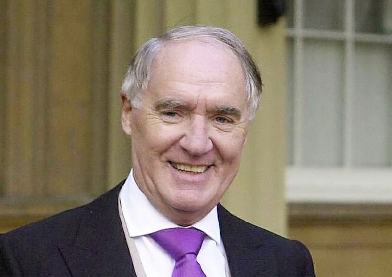 Sir David Barclay poses after receiving his knighthood from the Queen at Buckingham Palace January 18, 2004. u00e2u20acu201d AFP pic