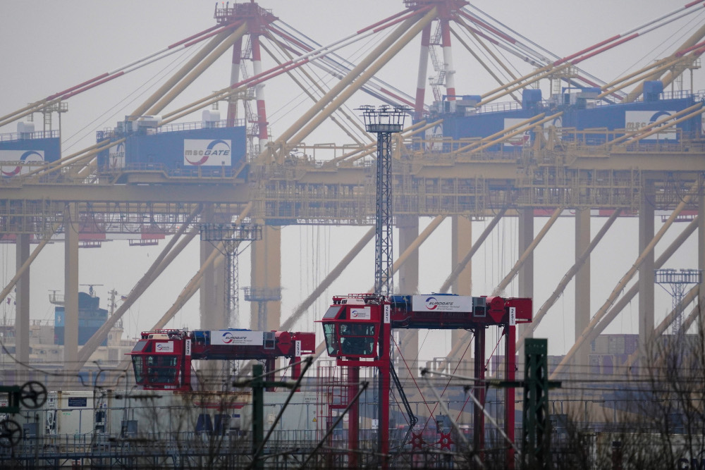 This file photo taken December 8, 2020 shows cargo facilities at the harbour of Bremerhaven, northern Germany. u00e2u20acu201d AFP pic
