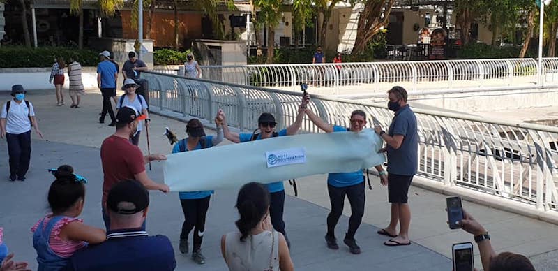 The ladies crossing the 100km finish line at Straits Quay Marina. — Picture courtesy of Rebecca Roberts