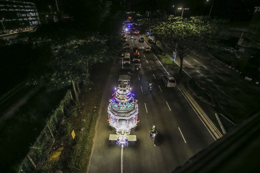 The chariot bearing the statue of Lord Muruga travels from the Sri Maha Mariamman Temple in Kuala Lumpur to the Sri Subramaniam Swamy Temple in Batu Caves January 27, 2021. u00e2u20acu201d Picture by Hari Anggara