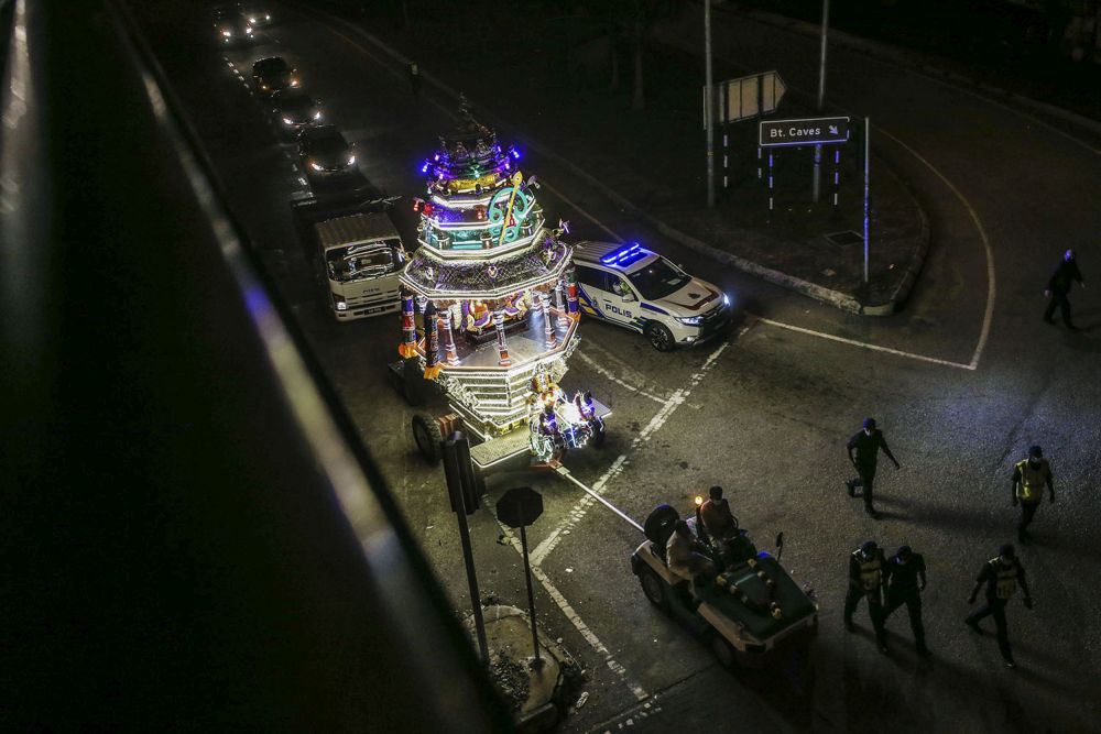 The chariot bearing the statue of Lord Muruga travels from the Sri Maha Mariamman Temple in Kuala Lumpur to the Sri Subramaniam Swamy Temple in Batu Caves January 27, 2021. u00e2u20acu201d Picture by Hari Anggara