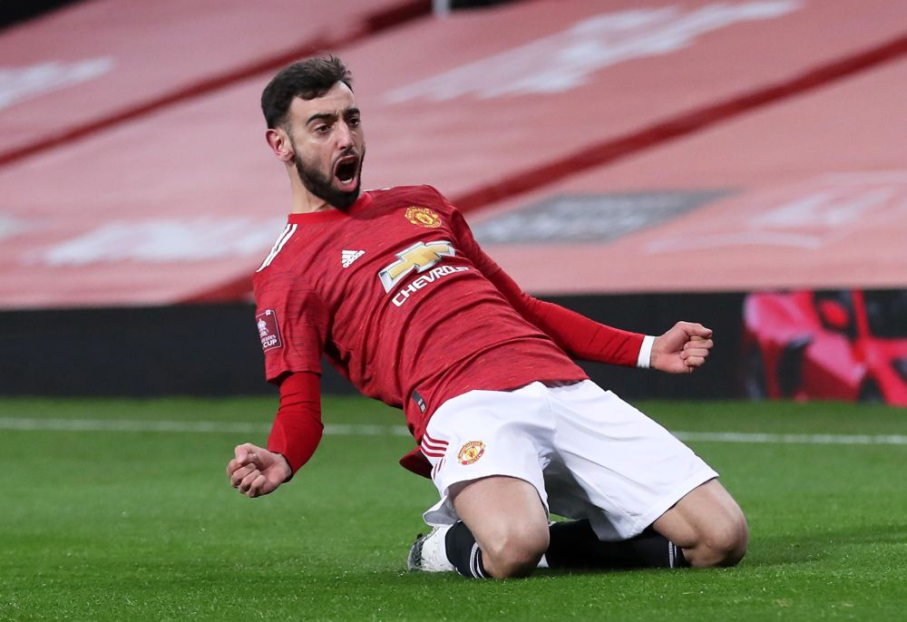Manchester United's Bruno Fernandes celebrates scoring their third goal against Liverpool with teammates at Old Trafford, Manchester January 24, 2021. u00e2u20acu201d Reuters pic