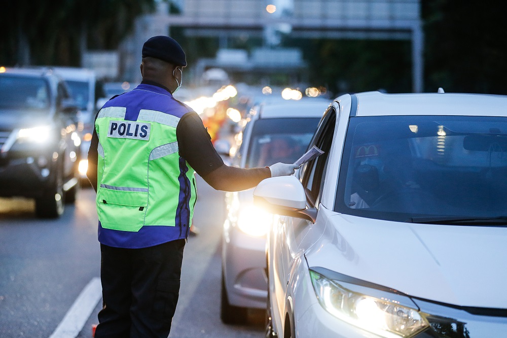 Police man a roadblock along the Tun Dr Lim Choong Eu Highway in Penang January 13, 2021. u00e2u20acu201d Picture by Sayuti Zainudin