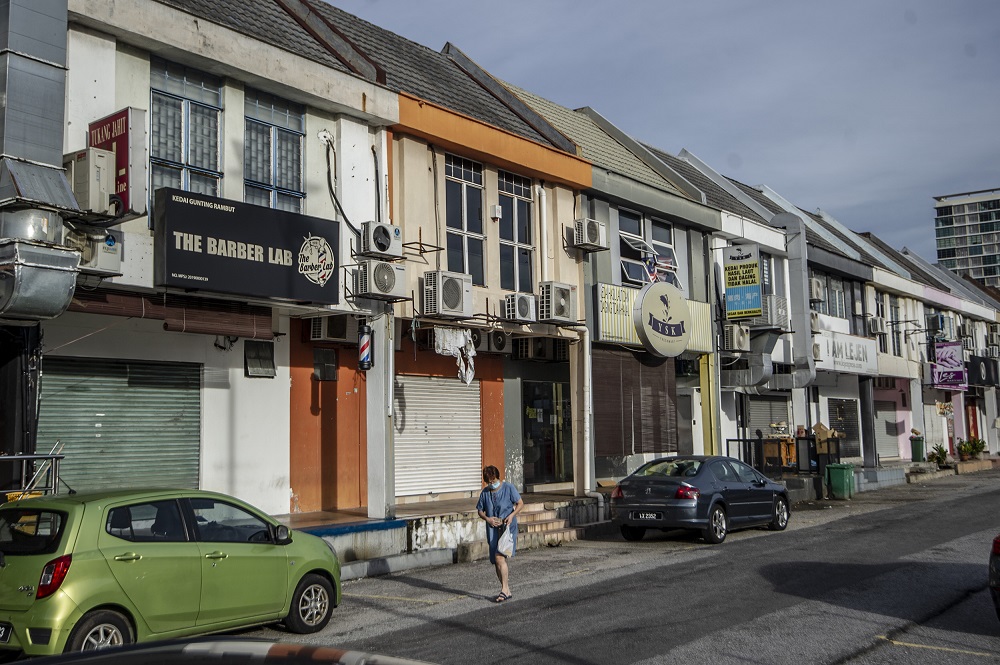 A row of shops that are closed are seen in SS15 on Day 1 of the movement control order (MCO) in Kuala Lumpur January 13, 2021. u00e2u20acu2022 Picture by Shafwan Zaidon