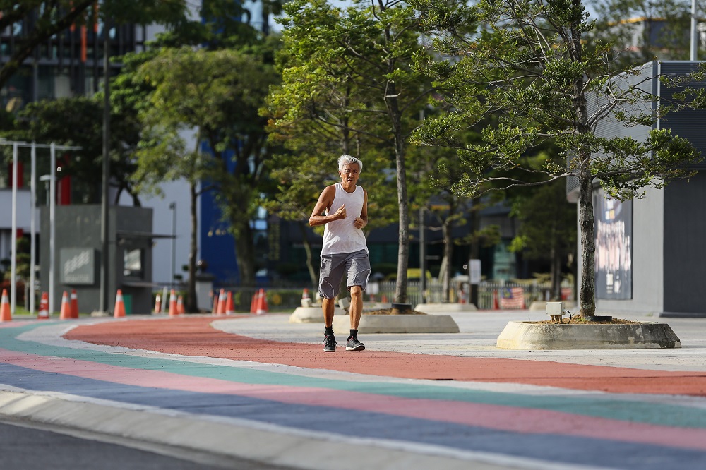 Chew Thiam Ho jogs at the Bukit Jalil Stadium on Day 1 of the movement control order in Kuala Lumpur January 13, 2021. ― Picture by Yusof Mat Isa