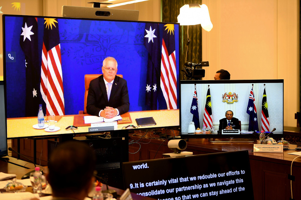 Prime Minister Tan Sri Muhyiddin Yassin and his Australian counterpart Scott John Morrison during the Malaysia-Australia Comprehensive Strategic Partnership Meeting which took place in a video conference at Perdana Putra January 27, 2021. u00e2u20acu201d Bernama pic
