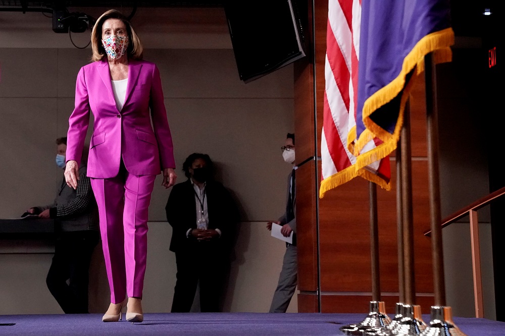 US House Speaker Nancy Pelosi arrives to hold news conference, a day after supporters of US President Donald Trump occupied the Capitol, in Washington January 7, 2021. u00e2u20acu2022 Reuters pic