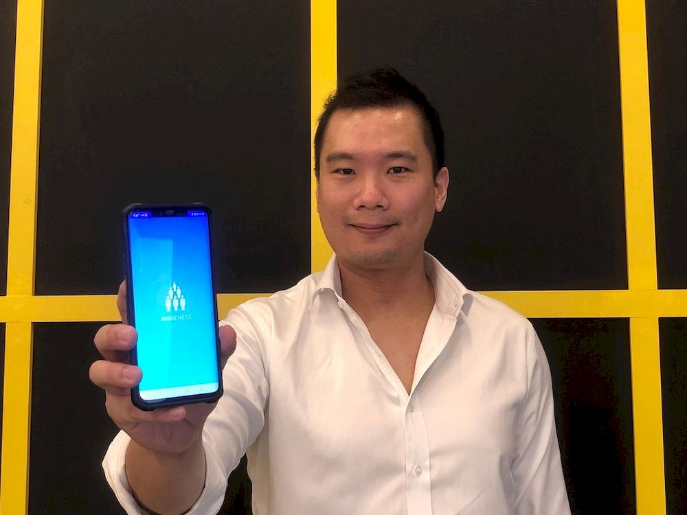 Nervotec founder Jonathan Lau with his firmu00e2u20acu2122s Awareness mobile application, which can measure a useru00e2u20acu2122s heart rate and oxygen saturation with just a front-facing camera. u00e2u20acu201d TODAY pic
