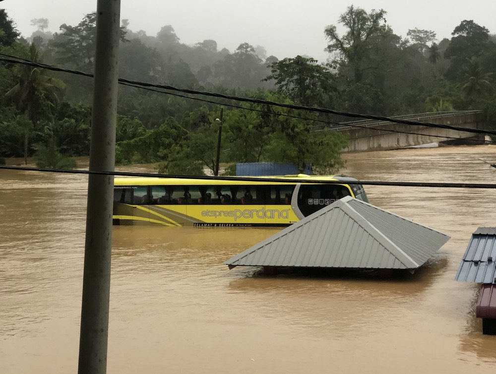 A view of the stalled express bus from the mosque at Kampung Jeram Besu January 5, 2021. u00e2u20acu201d Picture via Twitter/@farysnordyn