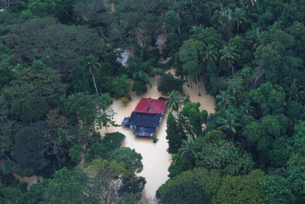 A residentu00e2u20acu2122s house is seen flooded after heavy rain fell for more than three days during an air survey with the Fire and Rescue Department of Malaysia (JBPM) in Raub, Pahang, January 4, 2021. u00e2u20acu201d Bernama pic 