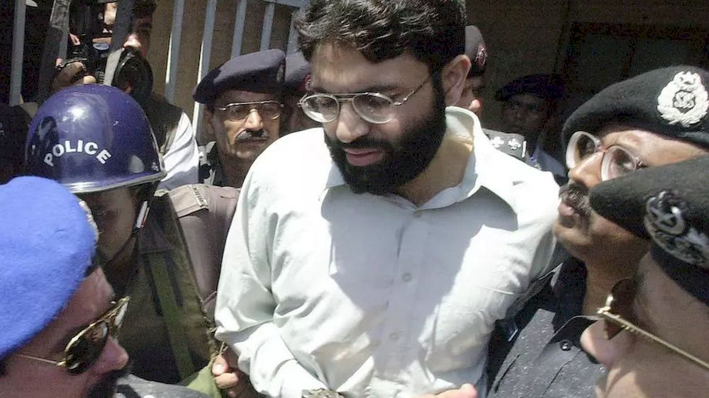 Ahmed Omar Saeed Sheikh (centre, pictured 2002), who had been convicted over the 2002 killing of American journalist Daniel Parl, was ordered released by a lower court. u00e2u20acu201d AFP pic