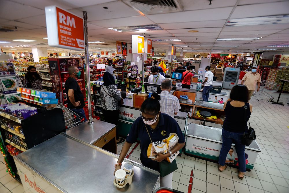 People are seen calmly shopping for provisions on the eve of MCO 2.0 here at a supermarket in Bayan Baru January 12, 2021. u00e2u20acu201d Picture by Sayuti Zainudin