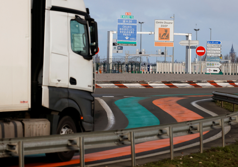 Orange and green lanes for entry into France and the EU are seen on the road as new customs infrastructure for Brexit at Eurotunnel terminal in Coquelles, near Calais December 31, 2020. u00e2u20acu201d Reuters pic