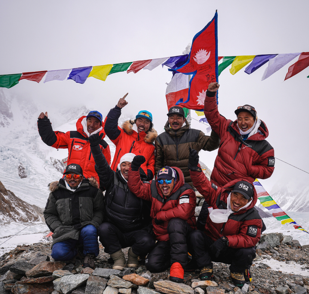 Nirmal u00e2u20acu02dcNimsu00e2u20acu2122 Purja, Dawa Tenji Sherp, Mingma G, Dawa Temba Sherpa and Pem Chiri Sherpa, Mingma David Sherpa, Mingma Tenzi Sherpa, Nimsdai Purja and Gelje Sherpa pose before the winter attack on K2 January 5, 2021. u00e2u20acu201d Picture by Nimsdai/Red Bull Cont