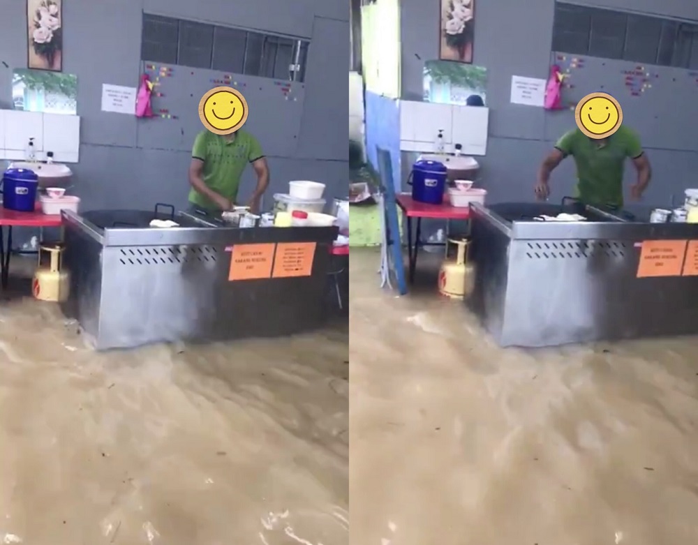 The worker continued to make roti canai despite floodwaters partially submerging the cafe. u00e2u20acu201d Screengrabs from Twitter/Freissyann