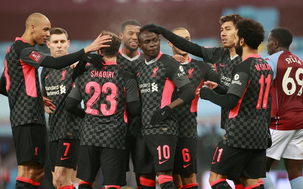 Liverpool's Sadio Mane celebrates scoring their third goal against Aston Villa January 9, 2021. u00e2u20acu2022 Pool via Reuters